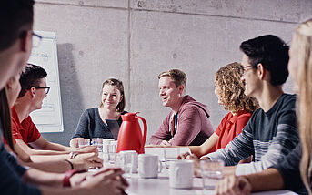 Rosenberger appretices in a meeting